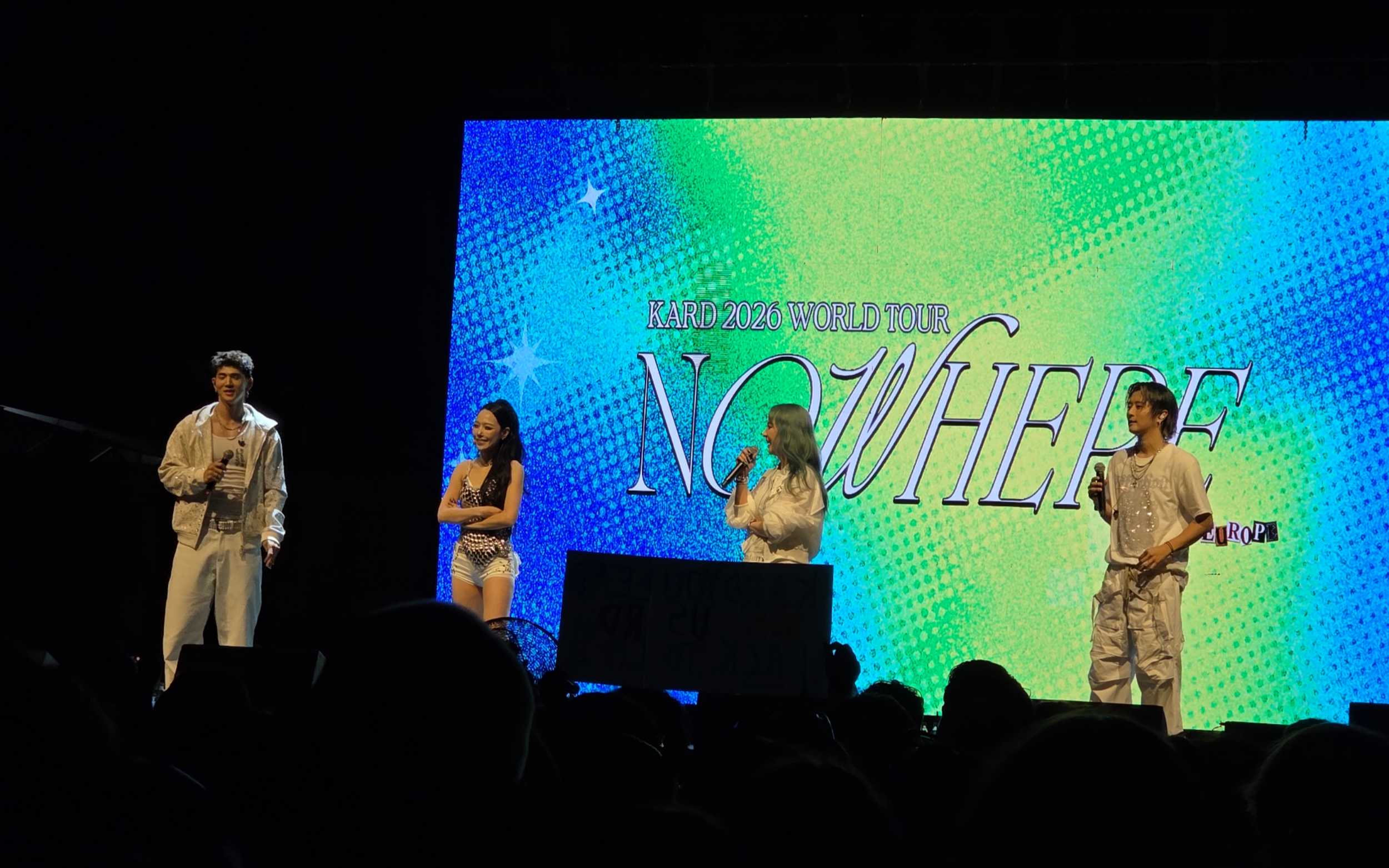 KARD members BM, Somin, Jiwoo and J.seph address the audience during a ment segment at Universe Multivenue in Athens on September 17, 2026.