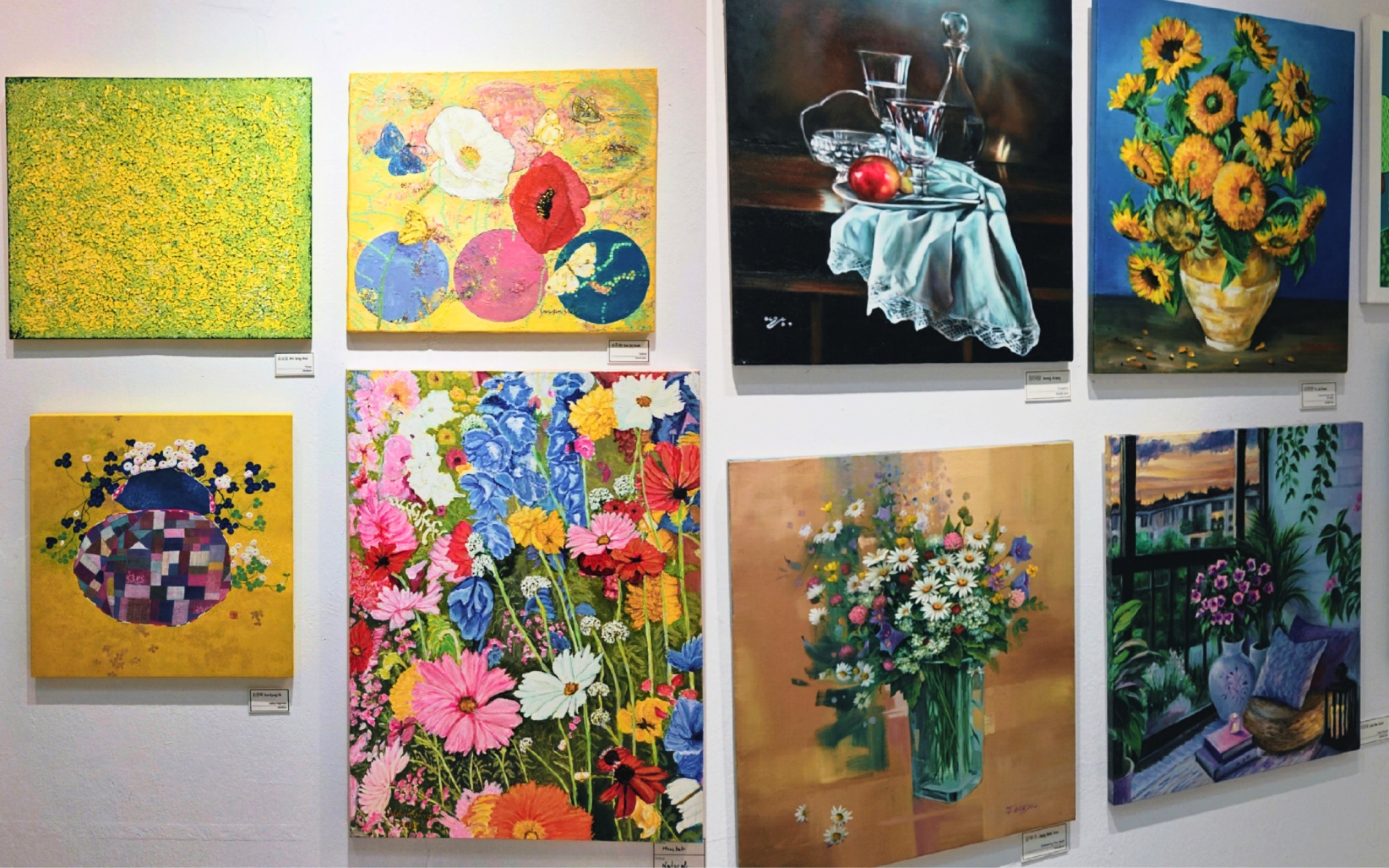 A glimpse of the colorful floral works throughout the exhibition, with flowers appearing in many different forms and artistic interpretations.